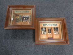 Two display frames containing French shop fronts, Pharmacie and Boulangerie.