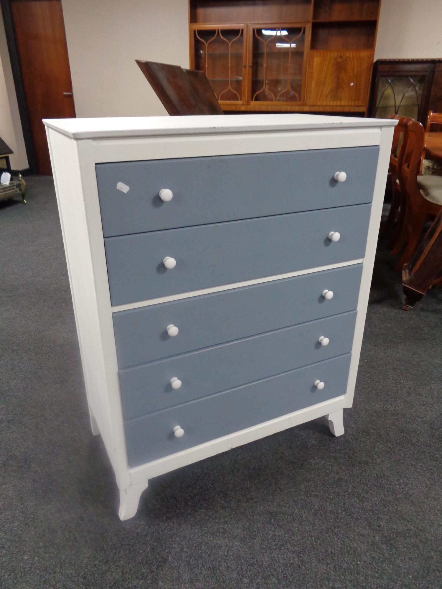 A painted 20th century Lebus Furniture five drawer chest