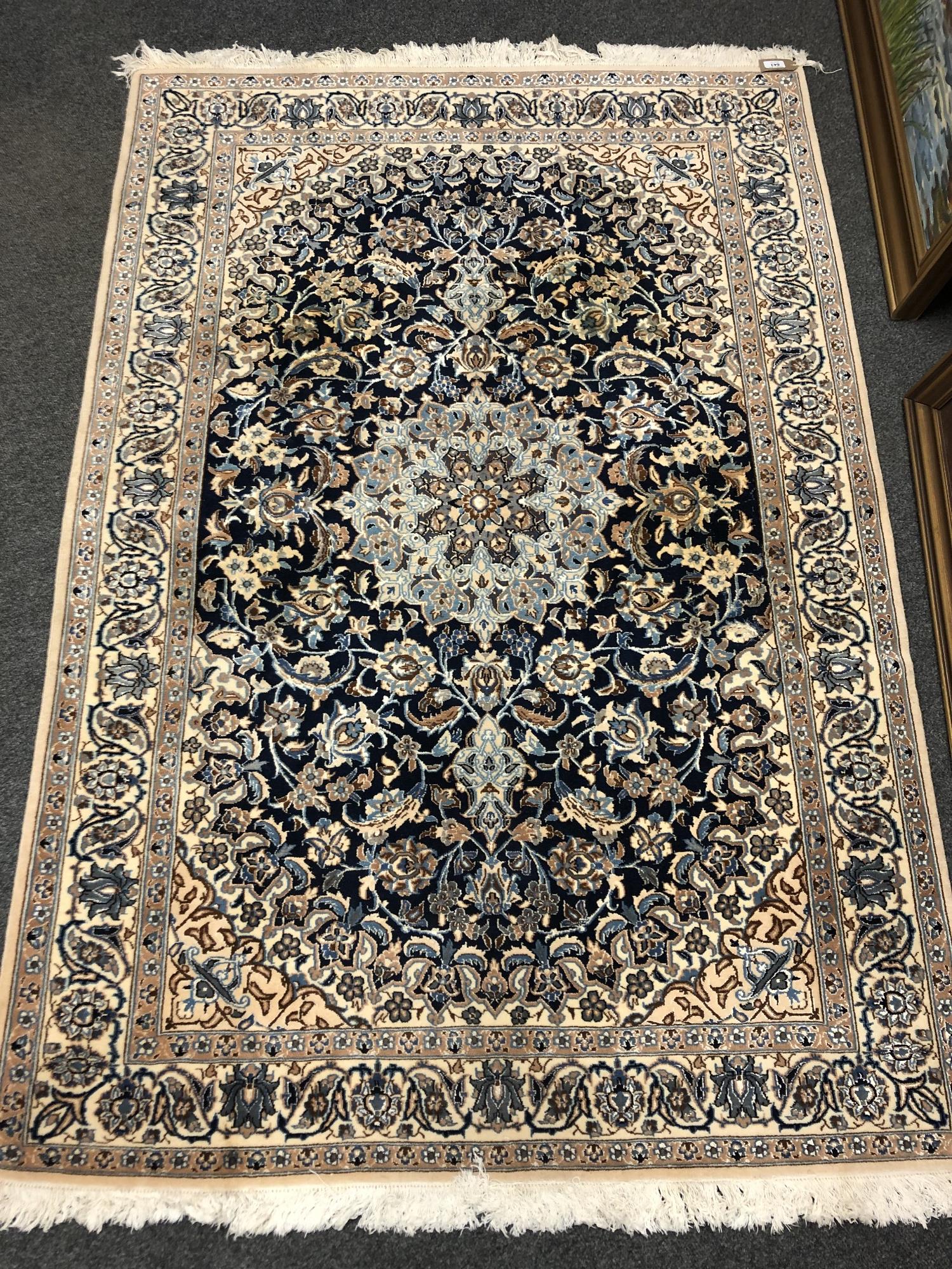 A fine Persian Nain rug,