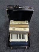 A Hohner Student II piano accordion.