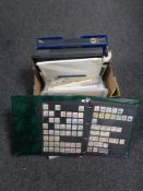 A box containing albums containing 20th century world stamps, loose stamps, smiler sheet.