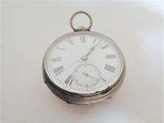 A silver pocket watch, London 1863.