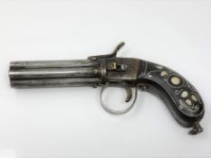 A 19th century Indian six barrel pepperbox revolver,