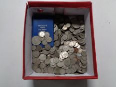 A box containing a large quantity of British pre decimal coinage to include six pence's,