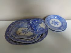 Twelve antique blue and white dinner plates and meat plates.