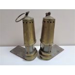 A pair of twentieth century brass bookends in the form of miner's lamps