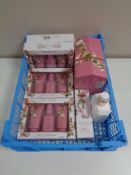 A box containing beauty products to include Ted Baker Pretty Little Blossom gift sets,