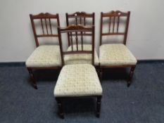 A set of four Edwardian mahogany dining chairs.