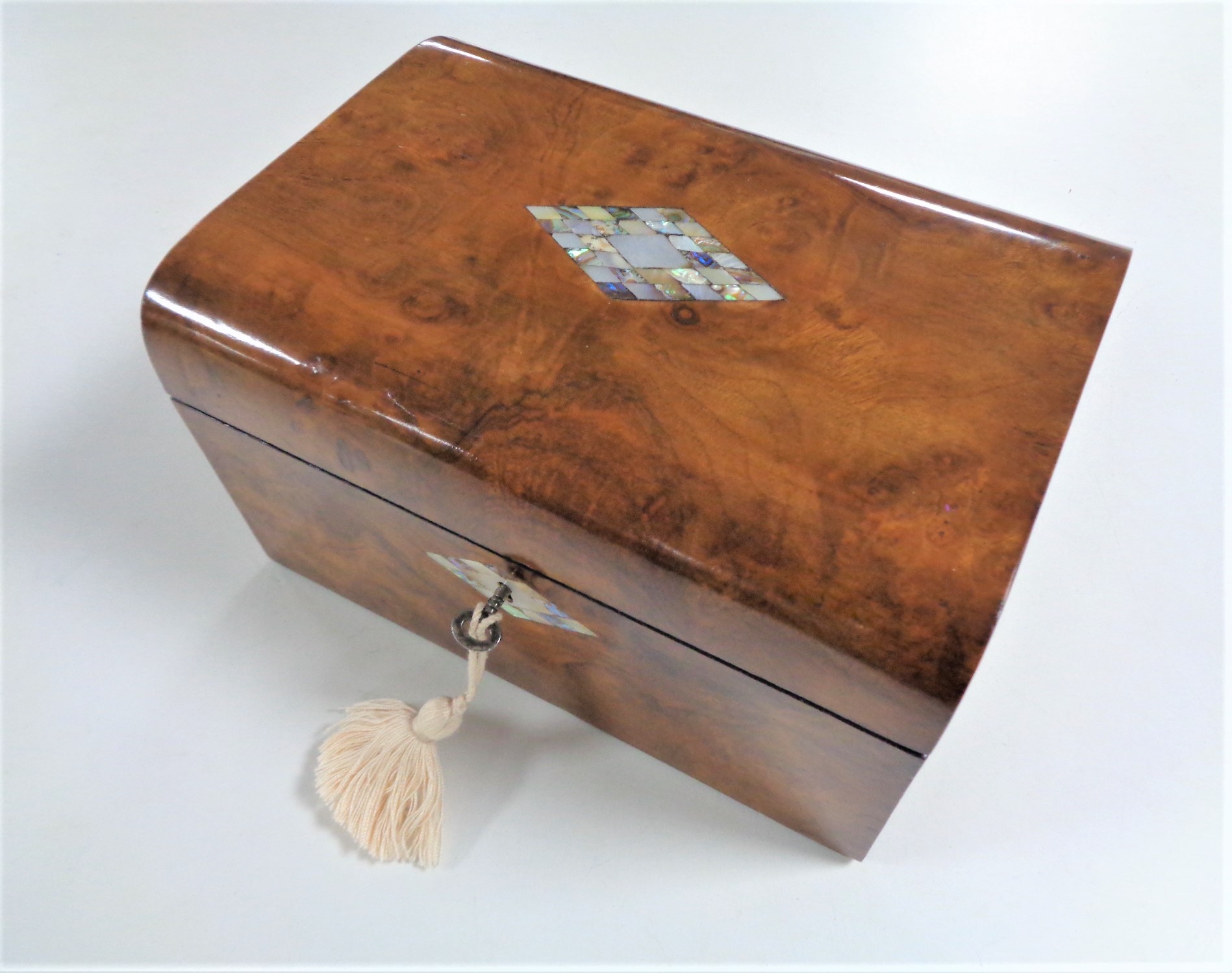 A good Victorian burr walnut fitted jewellery box with mother of pearl decoration,