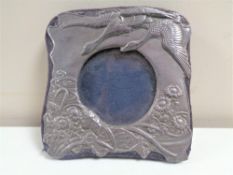 A silver Art Nouveau photo frame