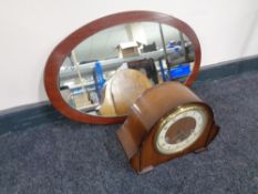 A twentieth century walnut cased Smith's mantel clock together with a frameless mirror