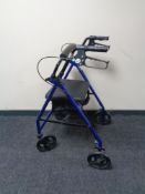 A Mobility walking aid with seat.