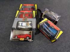 A tray of four Burago 1/25 and 1/24 scale die cast vehicles to include Range Rover, Ferrari,
