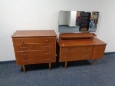 A mid 20th century teak dressing chest together with matching four drawer chest.