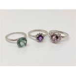 Three silver gem set dress rings