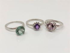 Three silver gem set dress rings