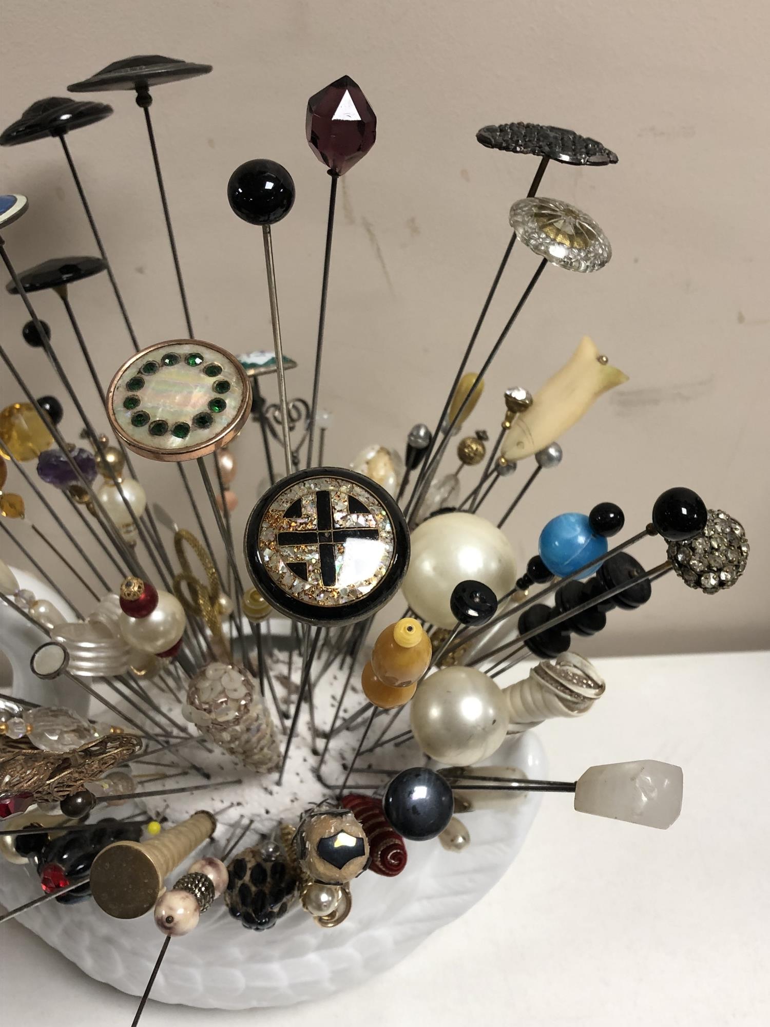 A collection of nearly one hundred stick pins and hat pins, some silver examples, - Image 2 of 5