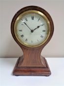 An Edwardian inlaid mantel clock with key