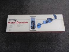 A boxed Zennox metal detector.