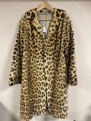 An early 20th century lady's 3/4 length leopard fur coat.