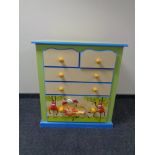 A contemporary five drawer nursery chest.