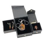 A suite of silver and Baltic amber jewellery by Nova Silver, comprising pendant on chain,