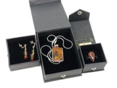 A suite of silver and Baltic amber jewellery by Nova Silver, comprising pendant on chain,