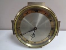 A twentieth century brass cased Charles Frodsham eight clock with key,