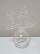 A Lalique perfume bottle