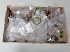 A box containing a quantity of assorted costume jewellery.