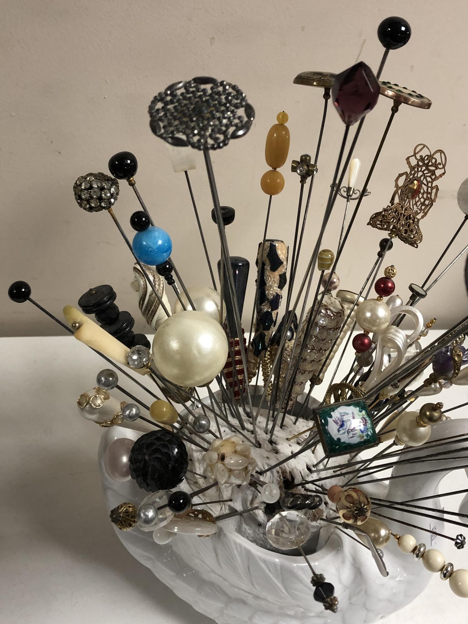 A collection of nearly one hundred stick pins and hat pins, some silver examples, - Image 4 of 5