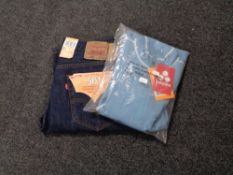 A pair of Levi jeans, waist 34, inseam 32, together with a Tog 24 lady's zip neck top,