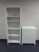 A set of contemporary open bookshelves together with matching double door cabinets (white).