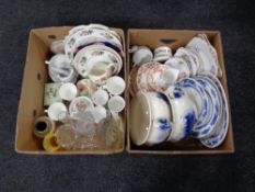 Two boxes containing antique and later tea china, two blue and white chamber pots,