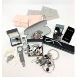 A quantity of jewellery items to include - two large hoop earrings and bangle, quartz wrist watch,