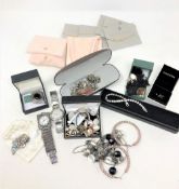 A quantity of jewellery items to include - two large hoop earrings and bangle, quartz wrist watch,