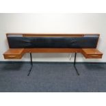 A mid 20th century Austin suite teak continental headboard.