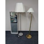 A 20th century white framed hall mirror together with a brass floor lamp with shade and a chrome