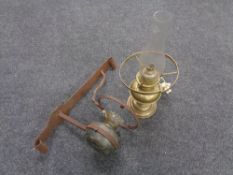 A brass Duplex oil lamp with glass chimney together with an oil lamp with antique cast bracket