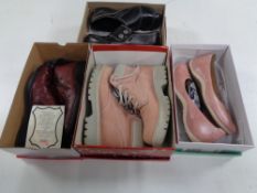 A box of four pairs of boxed lady's shoes and boots to include Rieker,