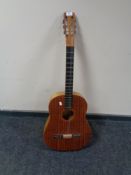 A mid 20th century Dick Covey made acoustic guitar.