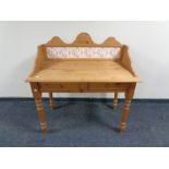 A pine tiled back wash stand, fitted two drawers.