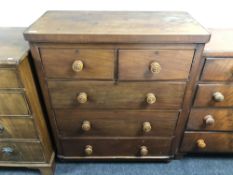 A Victorian pine five drawer chest