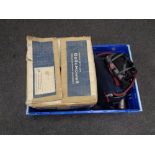 A crate containing a boxed Bell and Howell vintage projector together with a Samsung video camera,