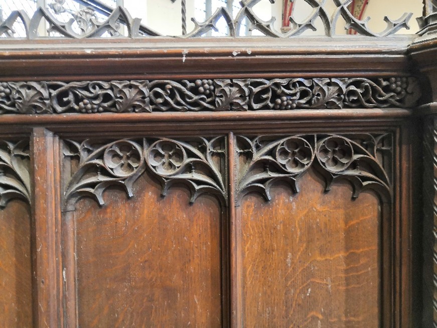 A two section end panel in Gothic revival carved oak, height 102 cm to the rail, - Image 4 of 4