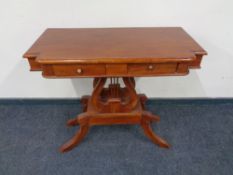 A Victorian style console table, fitted two drawers.