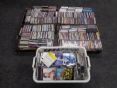 Five boxes containing assorted CDs.
