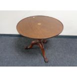 A 19th century circular inlaid mahogany pedestal occasional table.