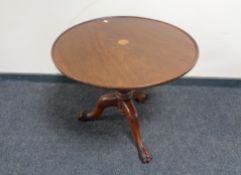 A 19th century circular inlaid mahogany pedestal occasional table.