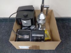 A box of Delonghi Caffe Treviso coffee machine, Philips radio,